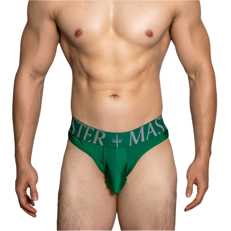 a sexy man in green DM Men’s Master Glossy Thong - pridevoyageshop.com - gay men’s thongs, boxers, briefs and jockstraps