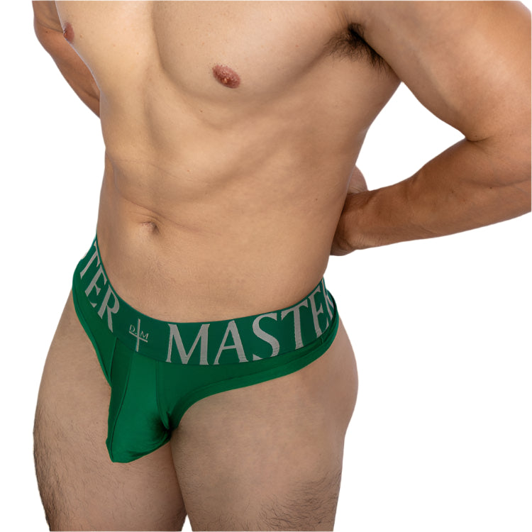 a sexy man in green DM Men’s Master Glossy Thong - pridevoyageshop.com - gay men’s thongs, boxers, briefs and jockstraps