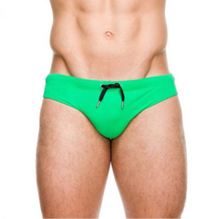 a sexy man in green Men’s Beach Brat Swim Briefs - pridevoyageshop.com - gay men’s sexy swim briefs, trunks, board shorts, and bikinis
