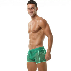 a sexy man in green Men’s Beacon Cruise Mesh Shorts – pridevoyageshop.com – gay men’s sexy swim briefs, trunks, board shorts, and bikinis