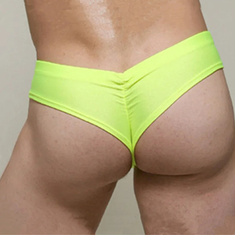 a sexy man in green Men’s Booty Drop Low-Rise Swim Briefs - pridevoyageshop.com - gay men’s sexy swim briefs, trunks, board shorts, and bikinis