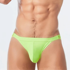 a sexy man in green Men’s Thigh High Rider Swim Briefs - pridevoyageshop.com - gay men’s sexy swim briefs, trunks, board shorts, and bikinis