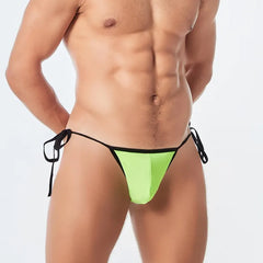 a sexy man in green Men’s Werk It Tie-Up Swim Bikini Thong – pridevoyageshop.com – gay men’s sexy swim briefs, trunks, board shorts, and bikinis