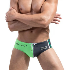 a sexy man in green and gray Desmiit Men’s Game On! Low Rise Swim Trunks - pridevoyageshop.com - gay men’s sexy swim briefs, trunks, board shorts, and bikinis