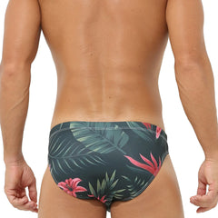 a sexy man in green leaf Men’s Rip Me Off Swim Briefs - pridevoyageshop.com - gay men’s sexy swim briefs, trunks, board shorts, and bikinis