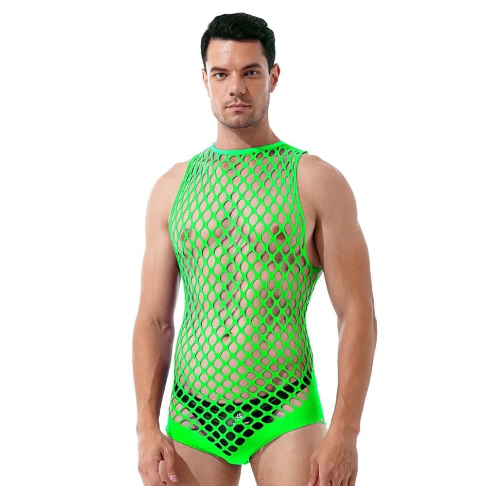 a sexy man in green wide-net tank bodysuit, see-through fishnet fabric showing abs and chest, queer rave energy – pridevoyageshop.com – gay men’s harness, lingerie and fetish wear