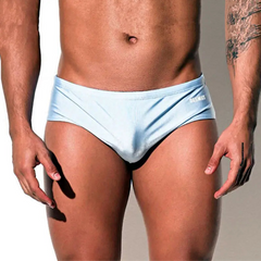 a sexy man in light blue Desmiit Men’s Pouch Devil Low Rise Swim Briefs - pridevoyageshop.com - gay men’s sexy swim briefs, trunks, board shorts, and bikinis