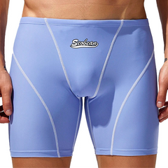a sexy man in light blue Men’s Code Lock Speed Vortex Compression Swim Shorts – pridevoyageshop.com – gay men’s sexy swim briefs, trunks, board shorts, and bikinis