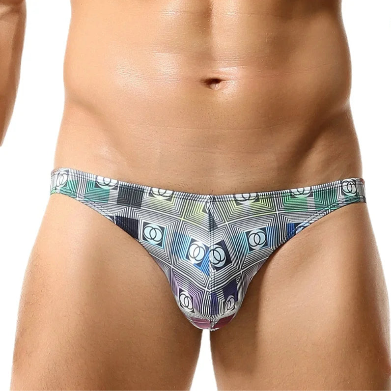 a sexy man in light gray Men’s Go Faster Swim Briefs - pridevoyageshop.com - gay men’s sexy swim briefs, trunks, board shorts, and bikinis