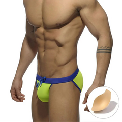 a sexy man in light green Men’s Forbidden Fruit Bikini Swim Briefs with pad - pridevoyageshop.com - gay men’s sexy swim briefs, trunks, board shorts, and bikinis
