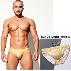 a sexy man in light yellow Men’s Pool Plumper Padded Swim Briefs - pridevoyageshop.com - gay men’s sexy swim briefs, trunks, board shorts, and bikinis