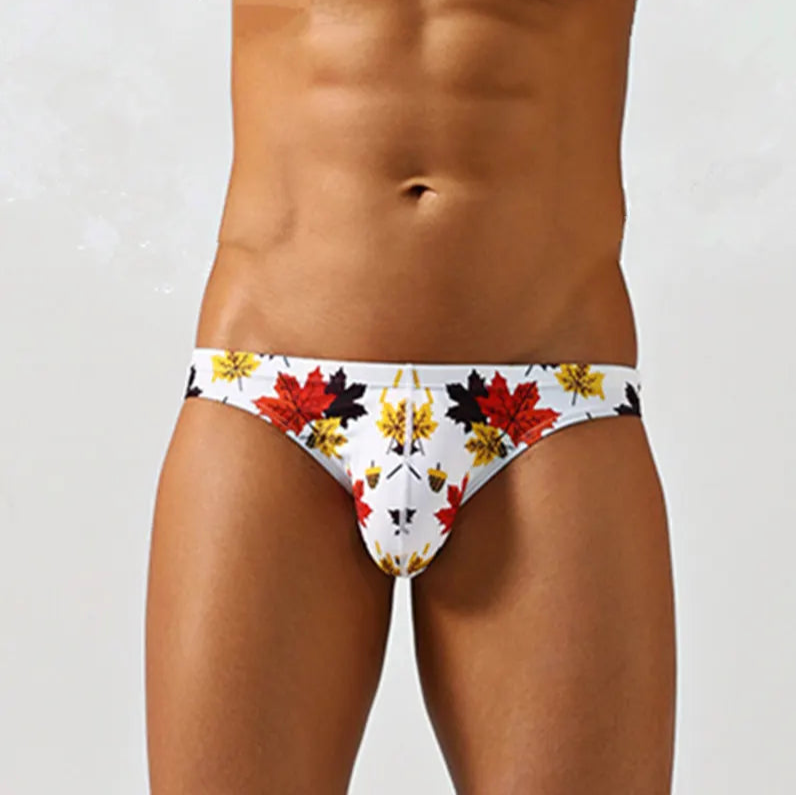 a sexy man in maple leaves Men’s Oh My Maple! Bikini Swim Briefs - pridevoyageshop.com - gay men’s sexy swim briefs, trunks, board shorts, and bikinis
