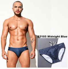 a sexy man in midnight blue Men’s Pool Plumper Padded Swim Briefs - pridevoyageshop.com - gay men’s sexy swim briefs, trunks, board shorts, and bikinis
