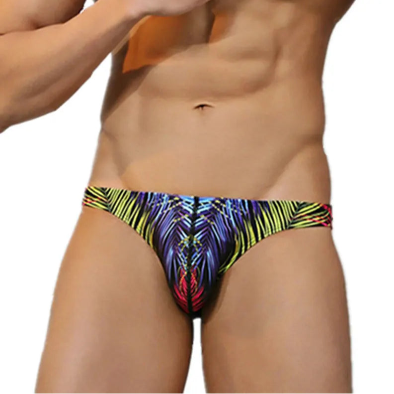 a sexy man in neon Men’s Jungle Jock Fantasy Low Rise Swim Briefs - pridevoyageshop.com - gay men’s sexy swim briefs, trunks, board shorts, and bikinis