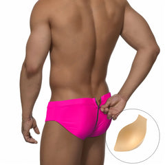 a sexy man in neon fushia Men's Unzip Me Daddy Swim Briefs with pad - pridevoyageshop.com - gay men’s sexy swim briefs, trunks, board shorts, and bikinis