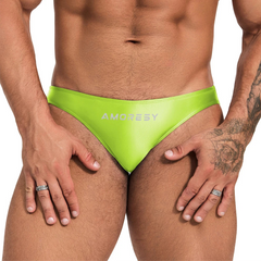a sexy man in neon green Men’s Shiny Lube Job Mini Swim Briefs - pridevoyageshop.com - gay men’s sexy swim briefs, trunks, board shorts, and bikinis