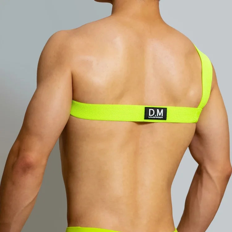 a sexy man in neon green Men’s Trigger Quick-Release Chest Harness – pridevoyageshop.com – gay men’s harness, lingerie and fetish wear