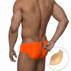 a sexy man in neon orange Men's Unzip Me Daddy Swim Briefs with pad - pridevoyageshop.com - gay men’s sexy swim briefs, trunks, board shorts, and bikinis
