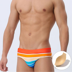 a sexy man in orange Men’s Bottom Line Stripe Swim Briefs with pad - pridevoyageshop.com - gay men’s sexy swim briefs, trunks, board shorts, and bikinis