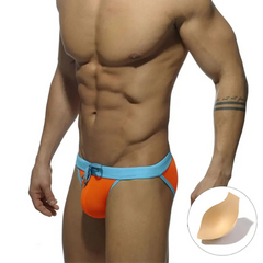 a sexy man in orange Men’s Forbidden Fruit Bikini Swim Briefs with pad - pridevoyageshop.com - gay men’s sexy swim briefs, trunks, board shorts, and bikinis