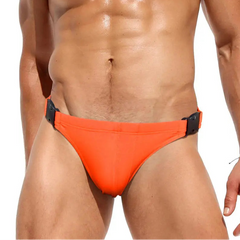 a sexy man in orange Men’s Unclip Me Double Buckle Swim Briefs - pridevoyageshop.com - gay men’s sexy swim briefs, trunks, board shorts, and bikinis