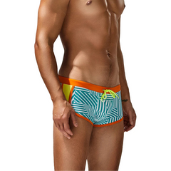 a sexy man in orange side SEOBEAN Men’s Obey the Stripe Low Rise Swim Trunks – pridevoyageshop.com – gay men’s sexy swim briefs, trunks, board shorts, and bikinis