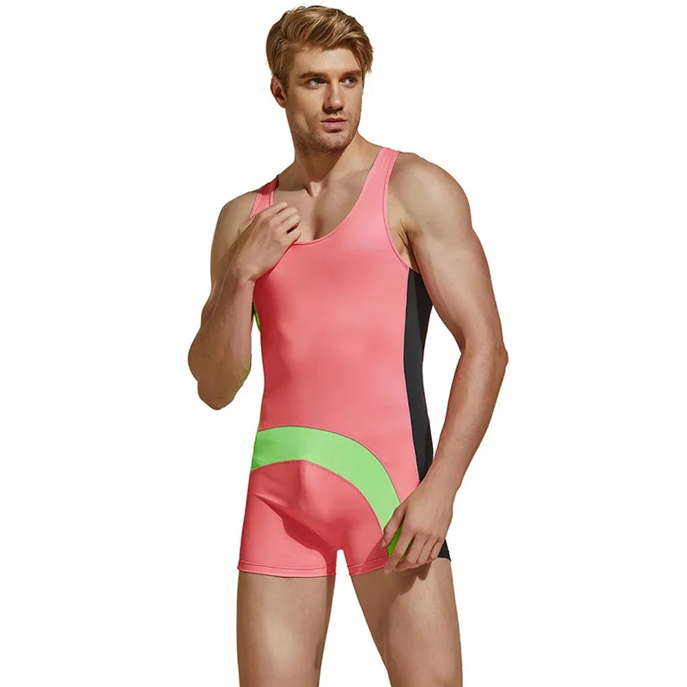 a sexy man in pink Men’s Kinetic Curve Singlet – pridevoyageshop.com – gay men’s harness, lingerie and fetish wear