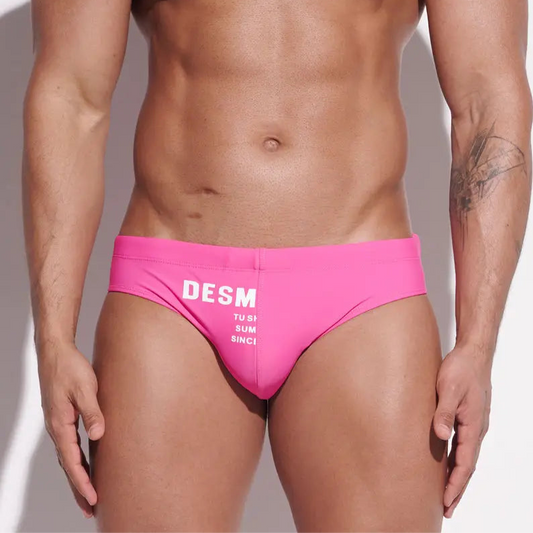 a sexy man in pink Men’s MVP Meatpack Swim Briefs - pridevoyageshop.com - gay men’s sexy swim briefs, trunks, board shorts, and bikinis