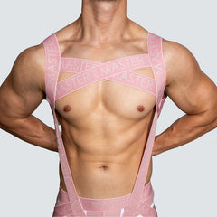 a sexy man in pink Men’s Masterclass Bondage Harness – pridevoyageshop.com – gay men’s harness, lingerie and fetish wear