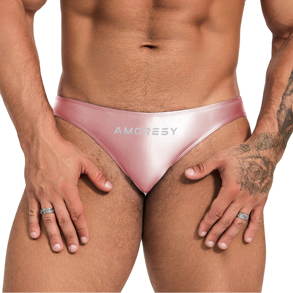 a sexy man in pink Men’s Shiny Lube Job Mini Swim Briefs - pridevoyageshop.com - gay men’s sexy swim briefs, trunks, board shorts, and bikinis