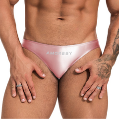 a sexy man in pink Men’s Shiny Lube Job Mini Swim Briefs - pridevoyageshop.com - gay men’s sexy swim briefs, trunks, board shorts, and bikinis