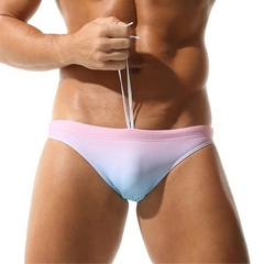 a sexy man in pink blue Seobean Men’s Poolside Craving Swim Briefs - pridevoyageshop.com - gay men’s sexy swim briefs, trunks, board shorts, and bikinis