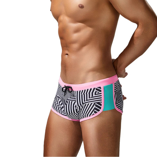 a sexy man in pink side SEOBEAN Men’s Obey the Stripe Low Rise Swim Trunks – pridevoyageshop.com – gay men’s sexy swim briefs, trunks, board shorts, and bikinis