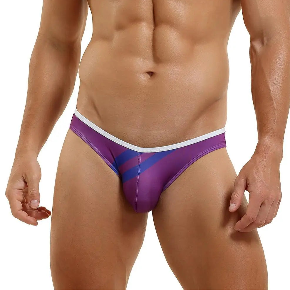 a sexy man in purple Men’s Dockside Bulge Swim Briefs - pridevoyageshop.com - gay men’s sexy swim briefs, trunks, board shorts, and bikinis