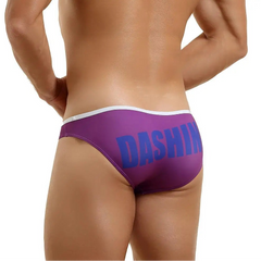 a sexy man in purple Men’s Dockside Bulge Swim Briefs - pridevoyageshop.com - gay men’s sexy swim briefs, trunks, board shorts, and bikinis