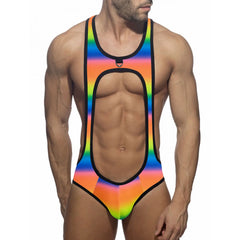 a sexy man in rainbow Pride Gladiator Harness-Cut Singlet with strappy chest cut-outs and sculpted body fit – pridevoyageshop.com – gay men’s harness, lingerie and fetish wear