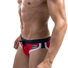 a sexy man in red Desmiit Men’s Colorblock Speed Bulge Swim Briefs - pridevoyageshop.com - gay men’s sexy swim briefs, trunks, board shorts, and bikinis