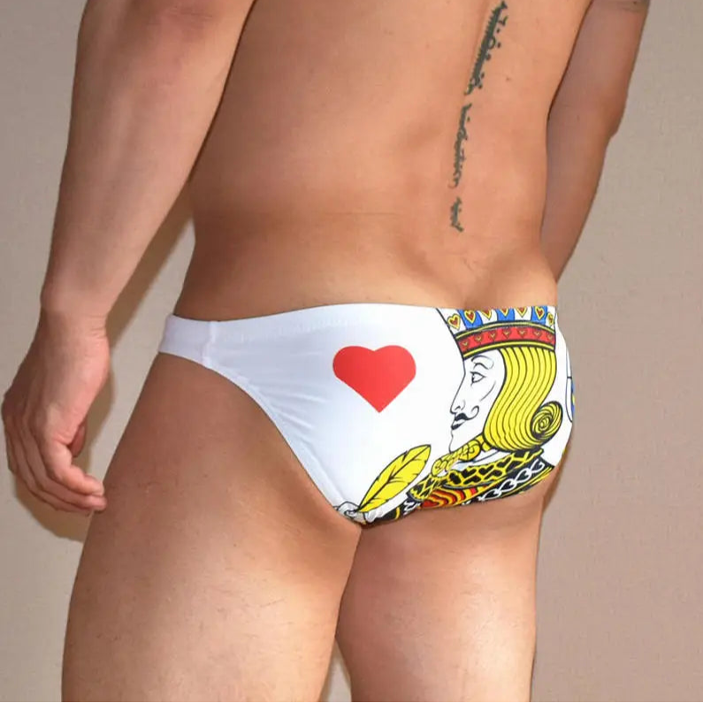 a sexy man in red J Men’s Strip Poker Swim Briefs - pridevoyageshop.com - gay men’s sexy swim briefs, trunks, board shorts, and bikinis