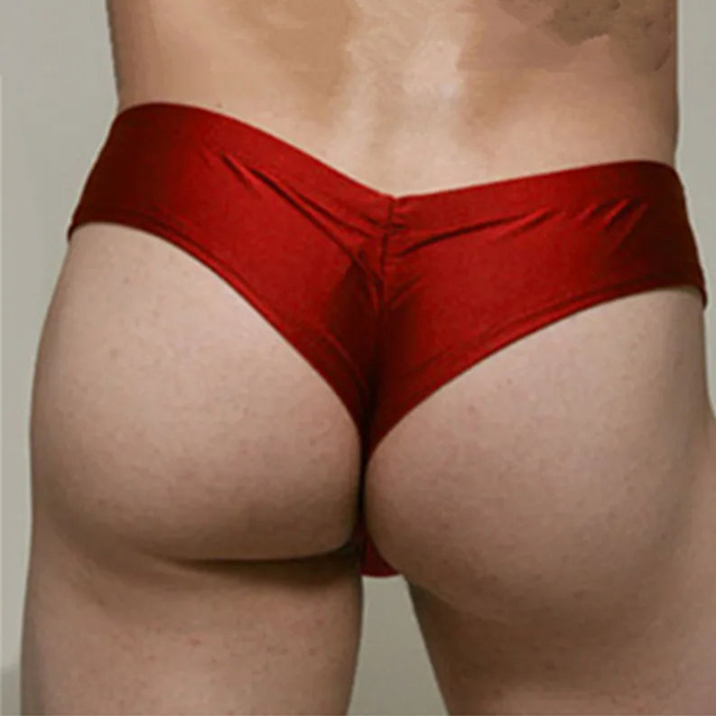 a sexy man in red Men’s Booty Drop Low-Rise Swim Briefs - pridevoyageshop.com - gay men’s sexy swim briefs, trunks, board shorts, and bikinis