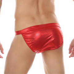 a sexy man in red Men’s Buck Me Swim Briefs - pridevoyageshop.com - gay men’s sexy swim briefs, trunks, board shorts, and bikinis
