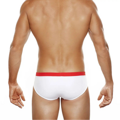 a sexy man in red Men’s Clean Line Hookup Swim Briefs - pridevoyageshop.com - gay men’s sexy swim briefs, trunks, board shorts, and bikinis