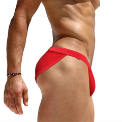 a sexy man in red Men’s Clean Slate Swim Briefs - pridevoyageshop.com - gay men’s sexy swim briefs, trunks, board shorts, and bikinis