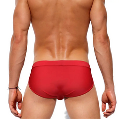 a sexy man in red Men’s Clean Slate Swim Briefs - pridevoyageshop.com - gay men’s sexy swim briefs, trunks, board shorts, and bikinis