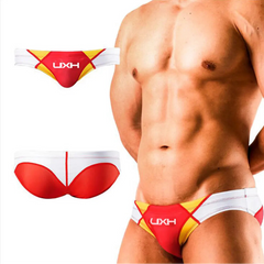 a sexy man in red Men’s Halftime Hard-On Swim Briefs - pridevoyageshop.com - gay men’s sexy swim briefs, trunks, board shorts, and bikinis