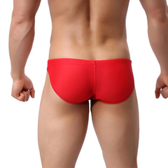 a sexy man in red Men’s Jock Strut Swim Briefs - pridevoyageshop.com - gay men’s sexy swim briefs, trunks, board shorts, and bikinis
