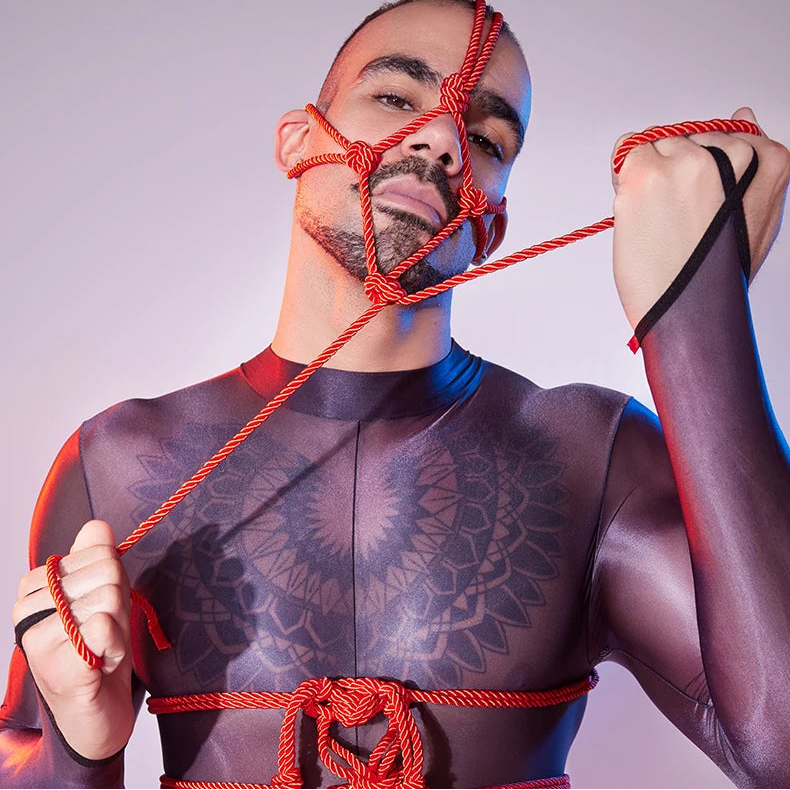 a sexy man in red Men’s Kinbaku Head Harness – pridevoyageshop.com – gay men’s harness, lingerie and fetish wear