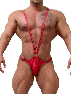 a sexy man in red Men’s Lockdown Suspender Jock Singlet – pridevoyageshop.com – gay men’s harness, lingerie and fetish wear