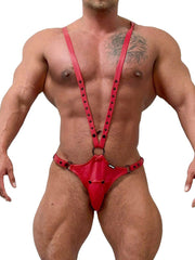 a sexy man in red Men’s Lockdown Suspender Jock Singlet – pridevoyageshop.com – gay men’s harness, lingerie and fetish wear