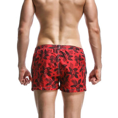 a sexy man in red Men’s Tap-Ready Tides Swim Beach Surf Shorts – pridevoyageshop.com – gay men’s sexy swim briefs, trunks, board shorts, and bikinis