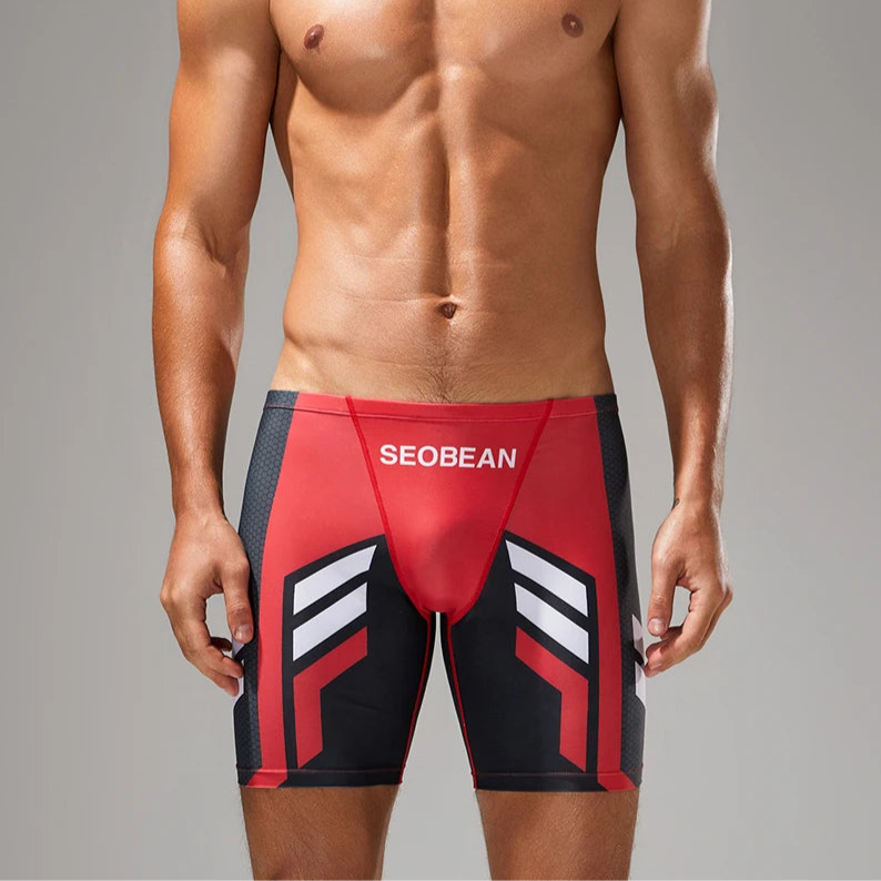 a sexy man in red Men’s Volt Strike Vortex Compression Swim Shorts – pridevoyageshop.com – gay men’s sexy swim briefs, trunks, board shorts, and bikinis